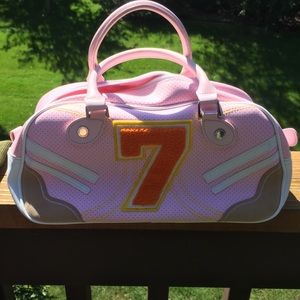 Samantha Thavasa pink Lucky 7 bag by Nicky Hilton
